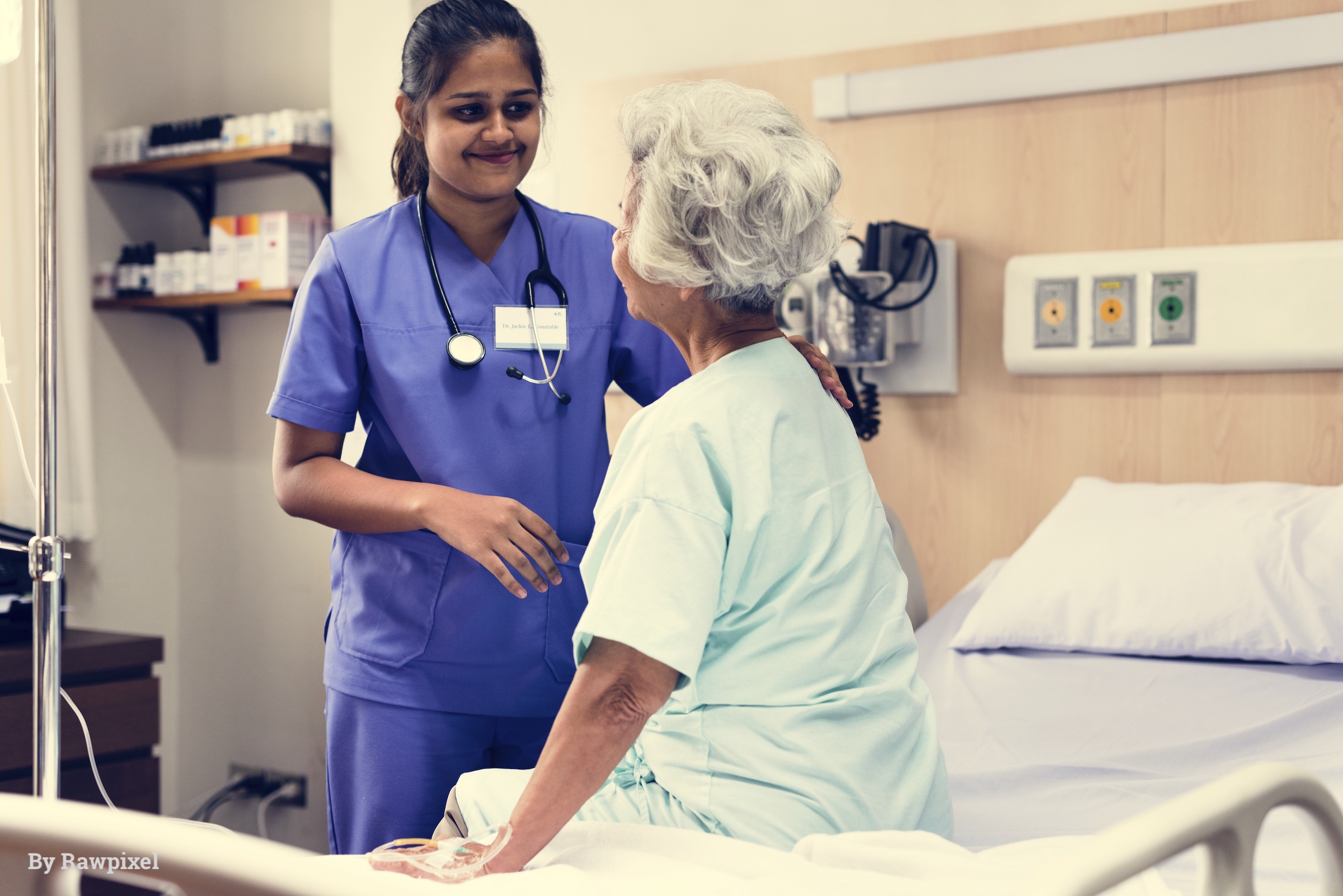 an-elderly-patient-at-the-hospital-with-doctor-P5HFJMU